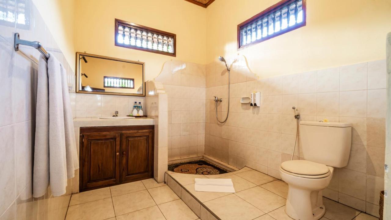 Cafe Wayan Cottages Сенггиги Экстерьер фото